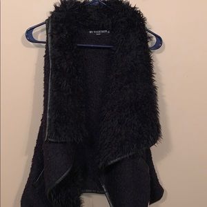 black fuzzy vest